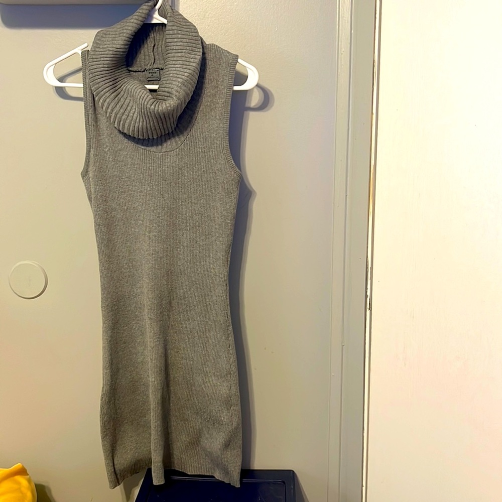 50 shades of gray sleeveless, mock turtleneck. Night out or a day in the office.